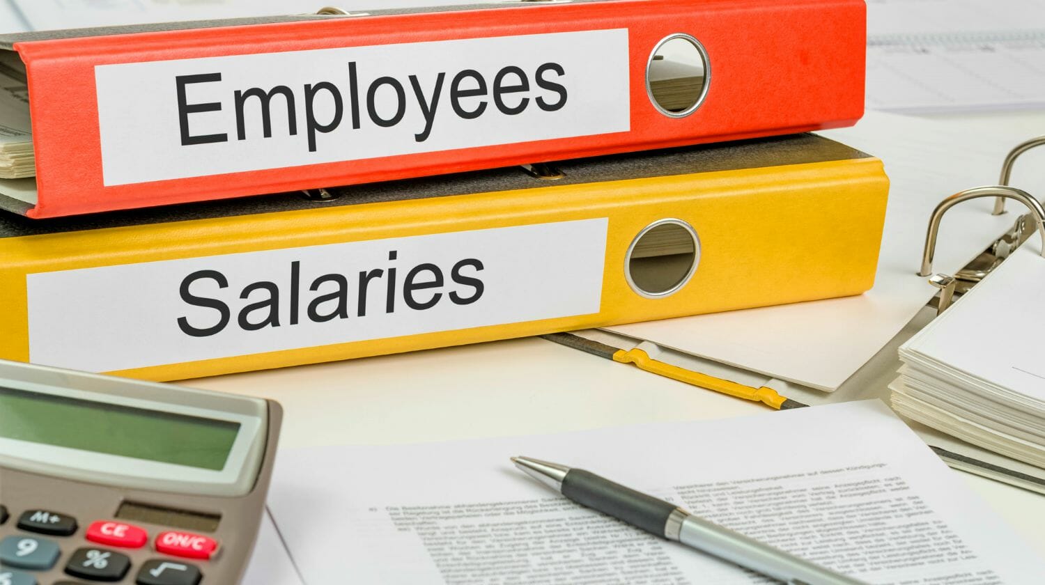 Featured | files on a desk | Key Points To Remember When You Calculate Payroll Taxes