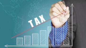Featured | businessman hand tax | How The New GOP Bill Will Increase Taxes For 5.2 Million Seniors | new tax bill