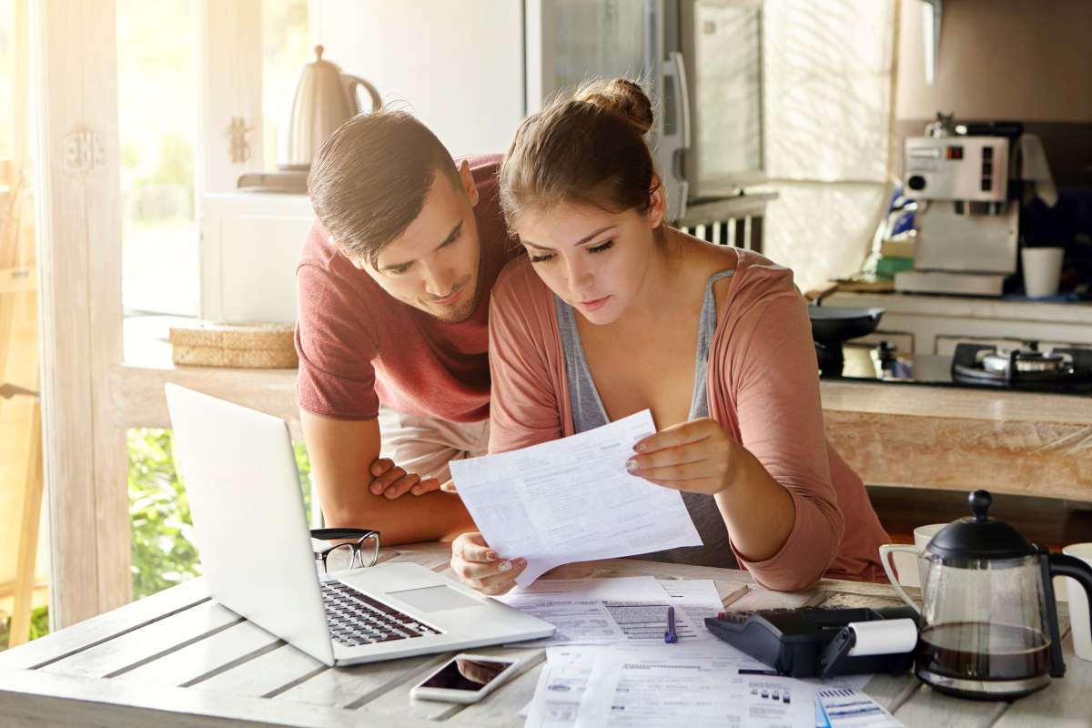 Young couple managing finances | Spousal Exemptions for 2017 | What Federal Tax Exemptions Can I Claim?