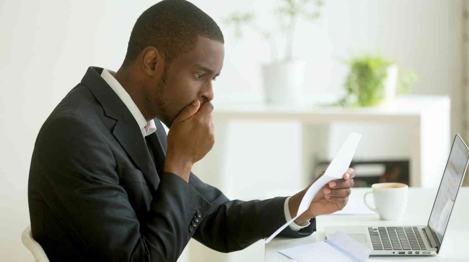 Feature | man shocked with mail | Currently Not Collectible | IRS Status | cnc
