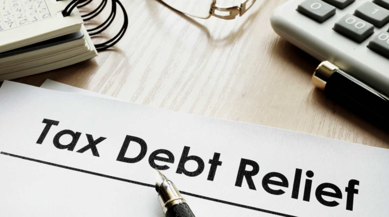 Feature | tax debt relief on paper | FAQs on Tax Debt Relief | tax relief
