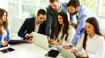 Feature | startup business team on meeting | MLM Tax Deductions For Taxpayers | mlm tax