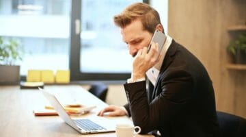 Feature | man having a phone call | Tips To Contact The IRS If You: Receive A Notice, Owe Back Taxes, Etc? | Local irs office