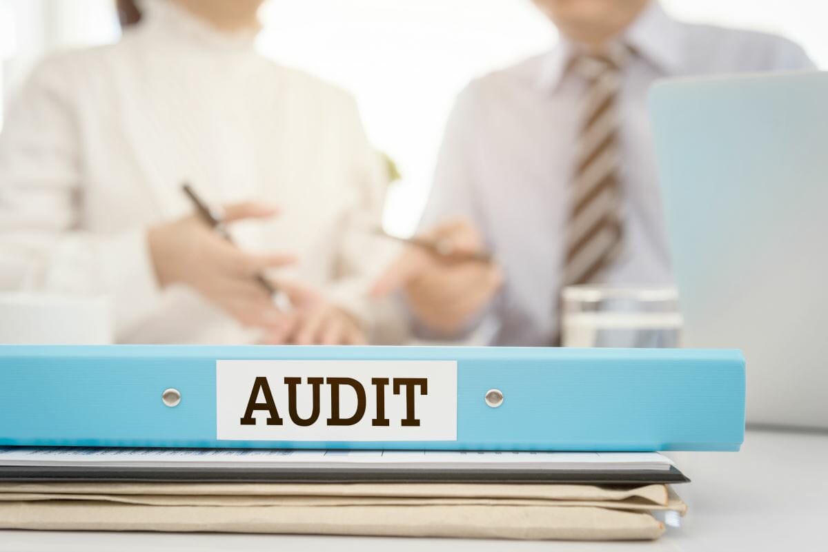 two auditors talking | What Is The IRS Tax Audit Process? | tax audit