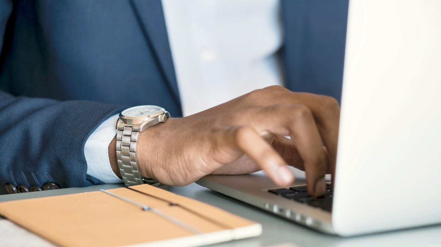 Feature | businessman using laptop | IRS Code 6662 Accuracy-Related Penalties | substantial understatement penalty